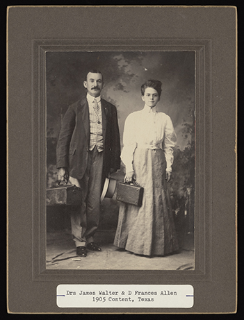 Full length studio portrait shows a man and woman holding medical bags.