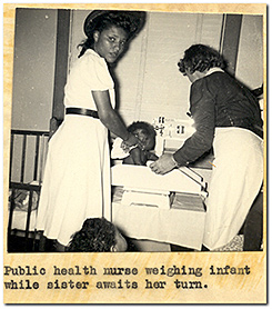 Public health nurse weighing infant while sister awaits her turn. 