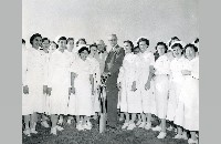 Amon Carter, Joe McVeigh, and nurses at St. Joseph's groundbreaking, 1953 (017-047-284)