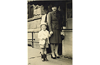 Gary Blevins with Mother, Eileen Blevins, Standing by R. E. Cox and Company, photographic postcard,