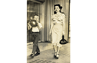 Gary Blevins with Mother, Eileen Blevins, Standing by R. E. Cox and Company, photographic postcard, 1947