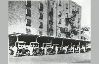 Armour delivery trucks in front of packing house (007-030-441)