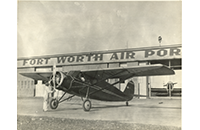 Aircraft on Tarmac at Fort Worth Air Port with Piolet in Cockpit and Man on Ground Turning Propeller, photograph, undated