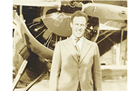 Unidentified Man Standing in Front of Aircraft Propeller, photograph, undated