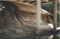 Erosion of bridge at Ridglea Country Club Drive, 1990 (093-007-126)