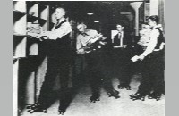 Montgomery Ward opening, stockboys on rollerskates (005-072-029)
