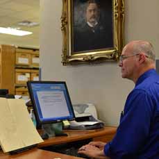 Roger Waite transcribing Baker diary in Tarrant County Archives 2013