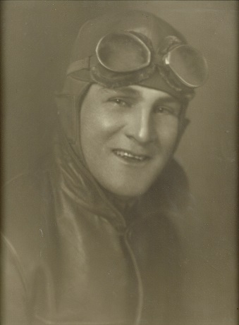 Russell H. Pearson wearing aviation goggles and cap