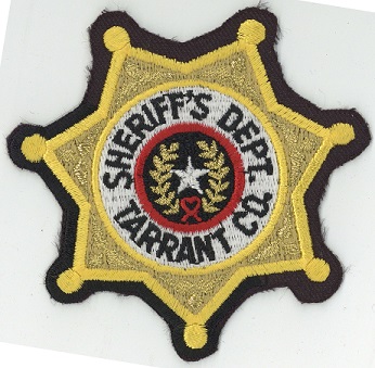 black and yellow multi-point badge