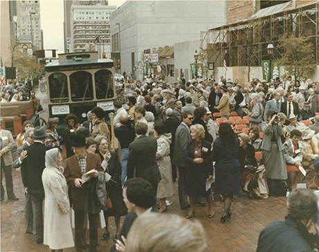 Color photograph of the crowd during ceremony of the restoration of the 1895 Courthouse held in 1983