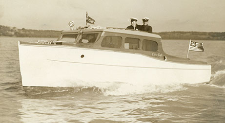 Ed Parker's Boat, Ray Wyatt and Skeet Haltom over cabin, February 1938
