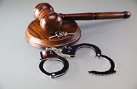 Gavel and handcuffs