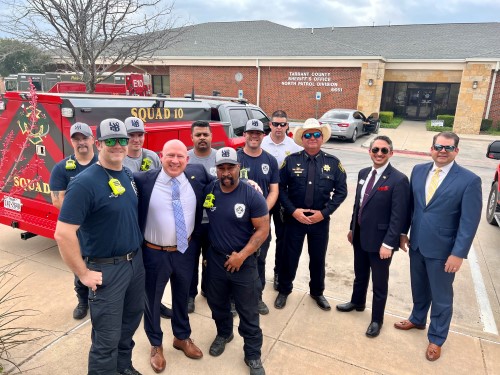 National Day prayer group photo of Judge with firemen