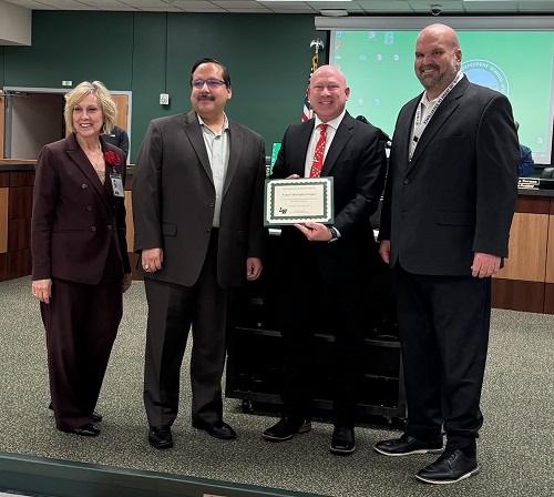Judge presented certificate of appreciation from Lake Worth ISD