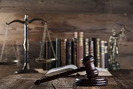 desk with books, scales, and gavel