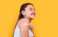 young girl with bandaid
