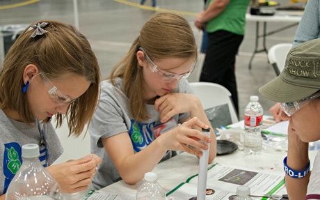 Teens working on a science project