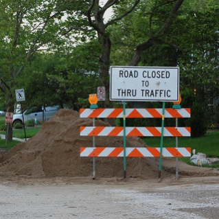 Road closed to thru traffic sign