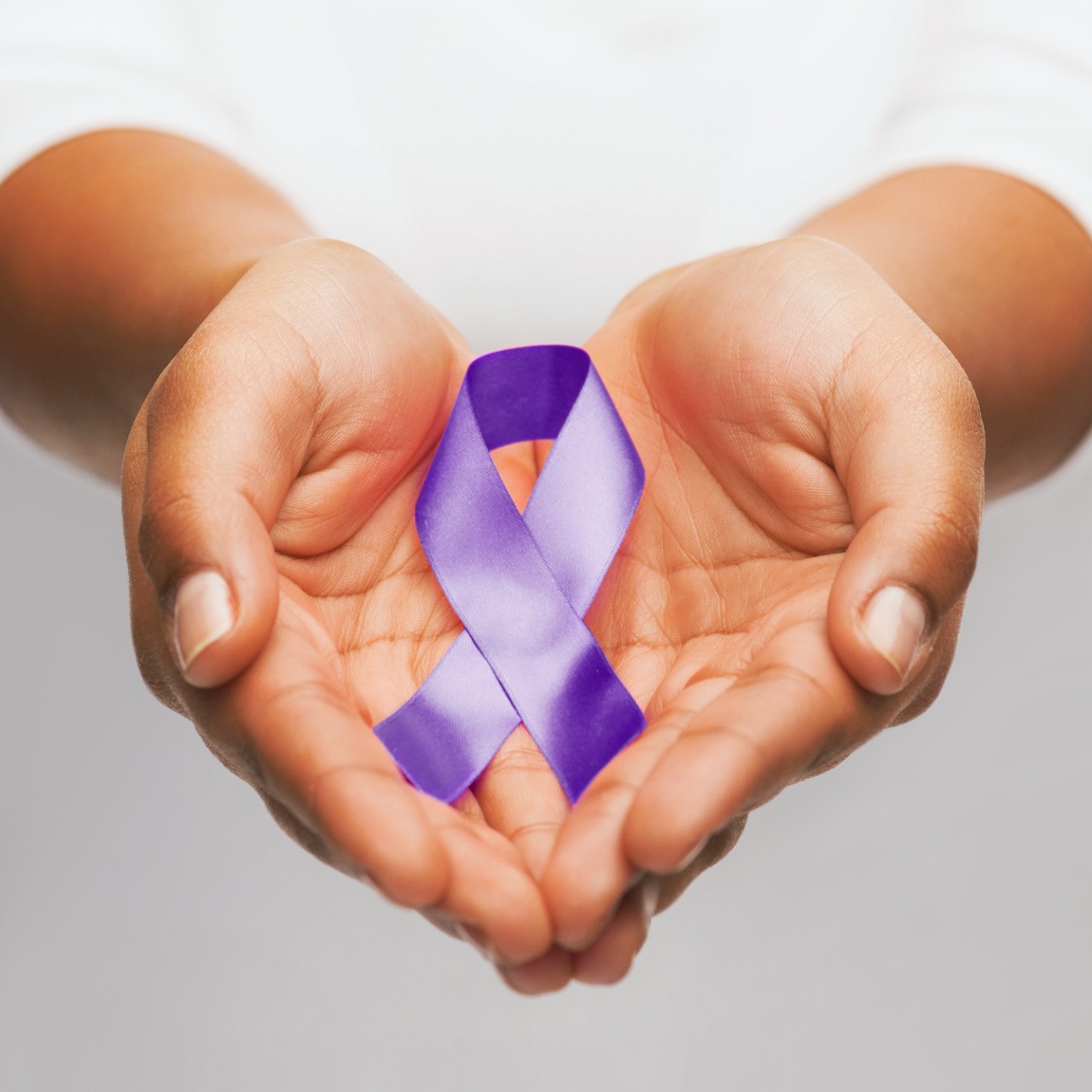 Hands with Purple Ribbon