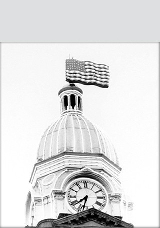Old Courthouse Photo with Flag on Top