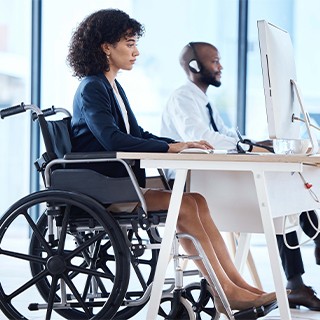 Man and woman in wheelchairs