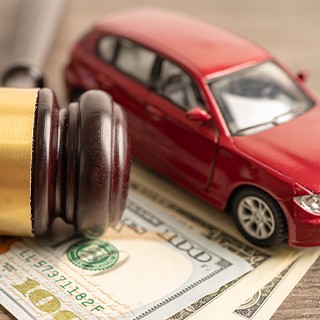 Picture of a car and gavel