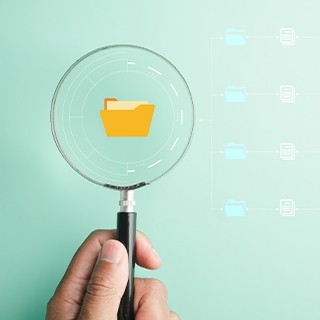 magnifying glass on folder