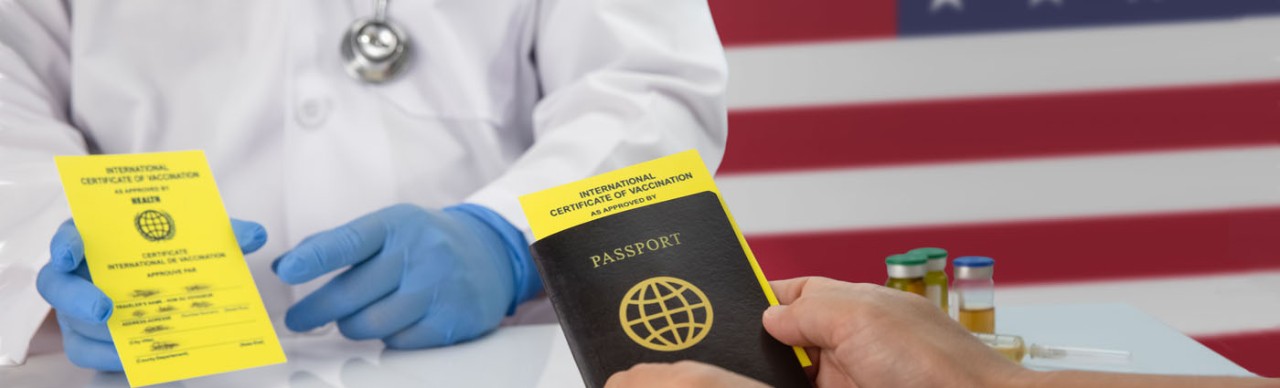Yellow vaccination card held by doctor, man holding passport with shot card