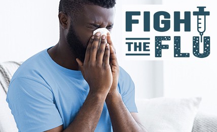 man blowing nose, text: Fight the Flu
