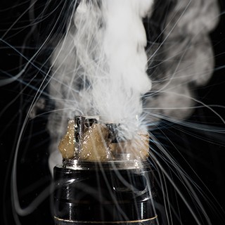 e-cigarette battery smoking and bubbling