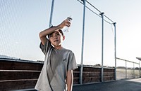 boy on running track sweating profusely