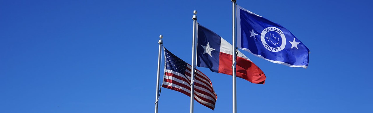 US, Texas, and Tarrant County flags